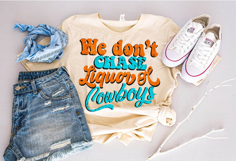 WE DON’T CHASE LIQUOR OR COWBOYS TEE